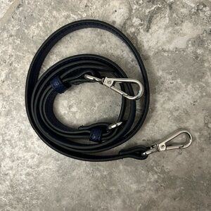 Blue textured purse strap with silver.